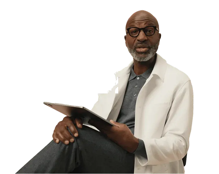 A smiling licensed provider holding a clipboard